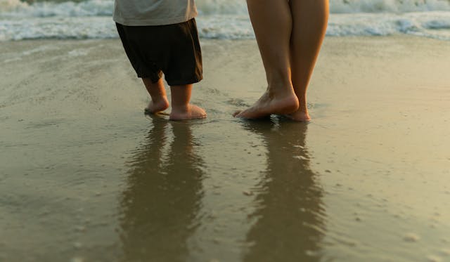 child walking on the beach